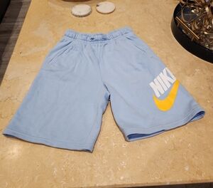Nike Kids Sky Blue Shorts with Bold Yellow Swoosh
